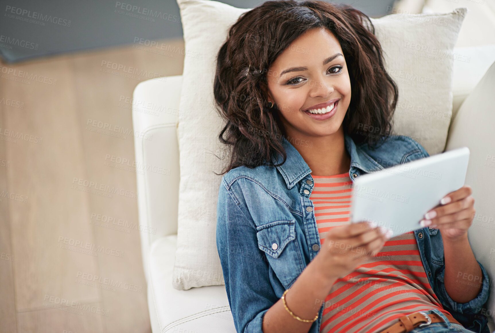 Buy stock photo Portrait, woman and couch at home with tablet for communication on digital technology in living room. Happy, gen z and female person and relax alone for weekend break with social media website