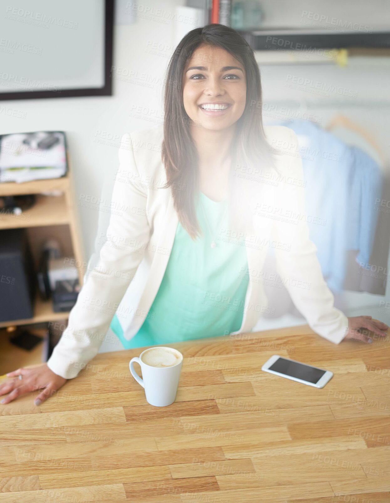 Buy stock photo Portrait, entrepreneur and woman at desk, fashion designer and confidence with lens flare Face, person and creative agency with talent, pride or coffee with startup, career ambition or clothing store