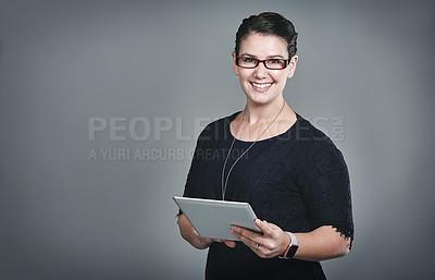 Buy stock photo Business woman, tablet and smile in studio portrait for notification with mock up space by background. Person, digital touchscreen and happy for deal, application or contact on social media in Greece