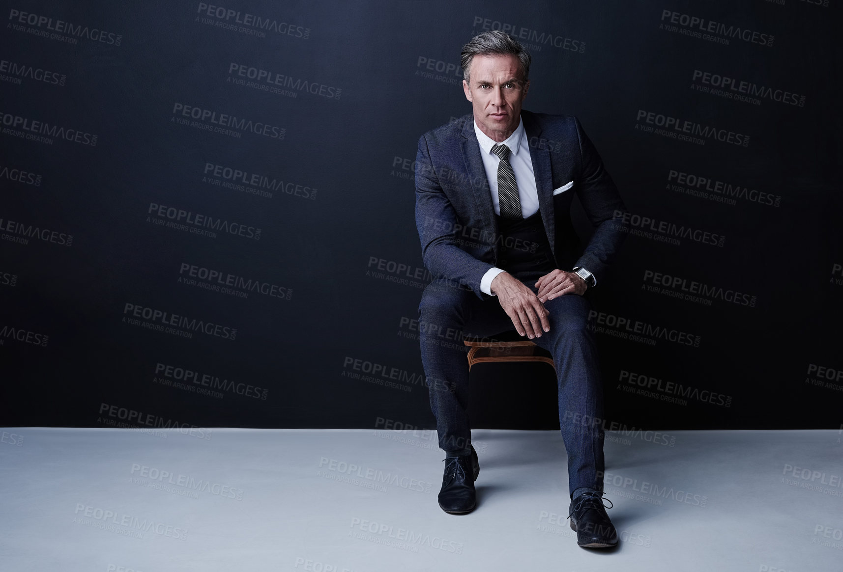 Buy stock photo Mature, businessman and portrait with fashion in studio for corporate style on a dark background. Man, professional or executive model with formal attire for business wear on chair or mockup space