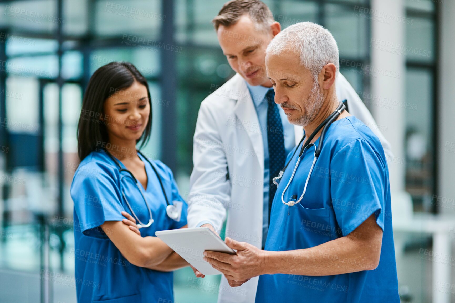 Buy stock photo Doctor, nurse and team with tablet for research or telehealth communication or online, consultation or teamwork. Men, woman and medical app for client conversation or internet, website or insurance