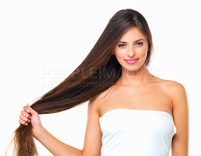 Buy stock photo Girl, hair care and happy with pull in studio for beauty, treatment or portrait by white background. Woman, model and smile for hairstyle, strong and growth with cosmetics for transformation in Italy