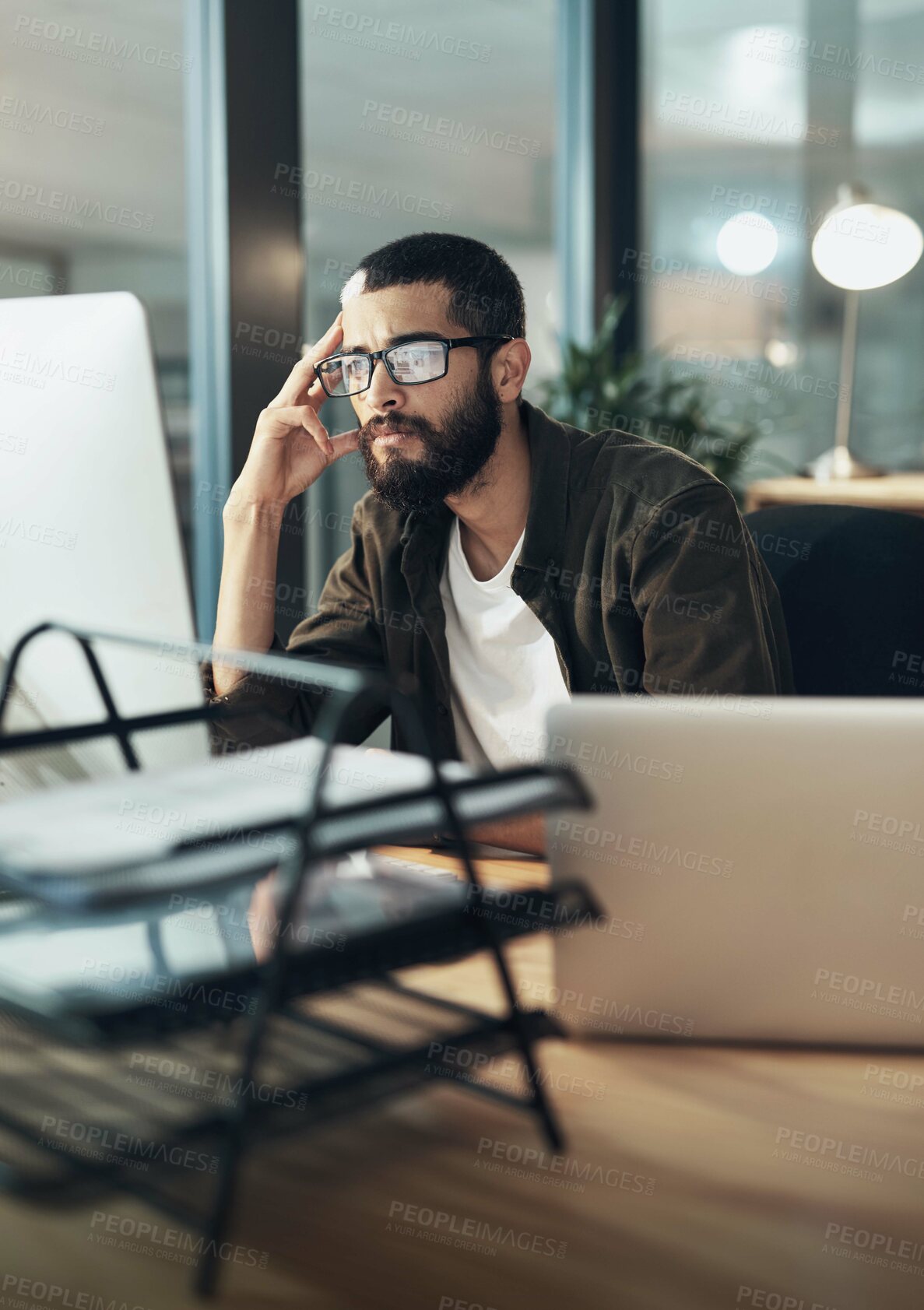 Buy stock photo Night, man or graphic designer on computer thinking in startup for online layout update or creative project. Late overtime, technology or person in media agency for homepage ideas and development