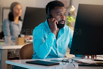 Buy stock photo Call center, microphone and black man with computer for working, consulting and business crm. Reading, male advisor and monitor for helping, customer service and inbound telemarketing in office