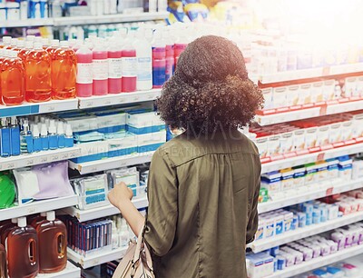 Buy stock photo Medicine, healthcare and woman in pharmacy for shopping with purchase for medical treatment supplies. Medication, pharmaceutical and back of female person looking for pills in drugstore chemist.