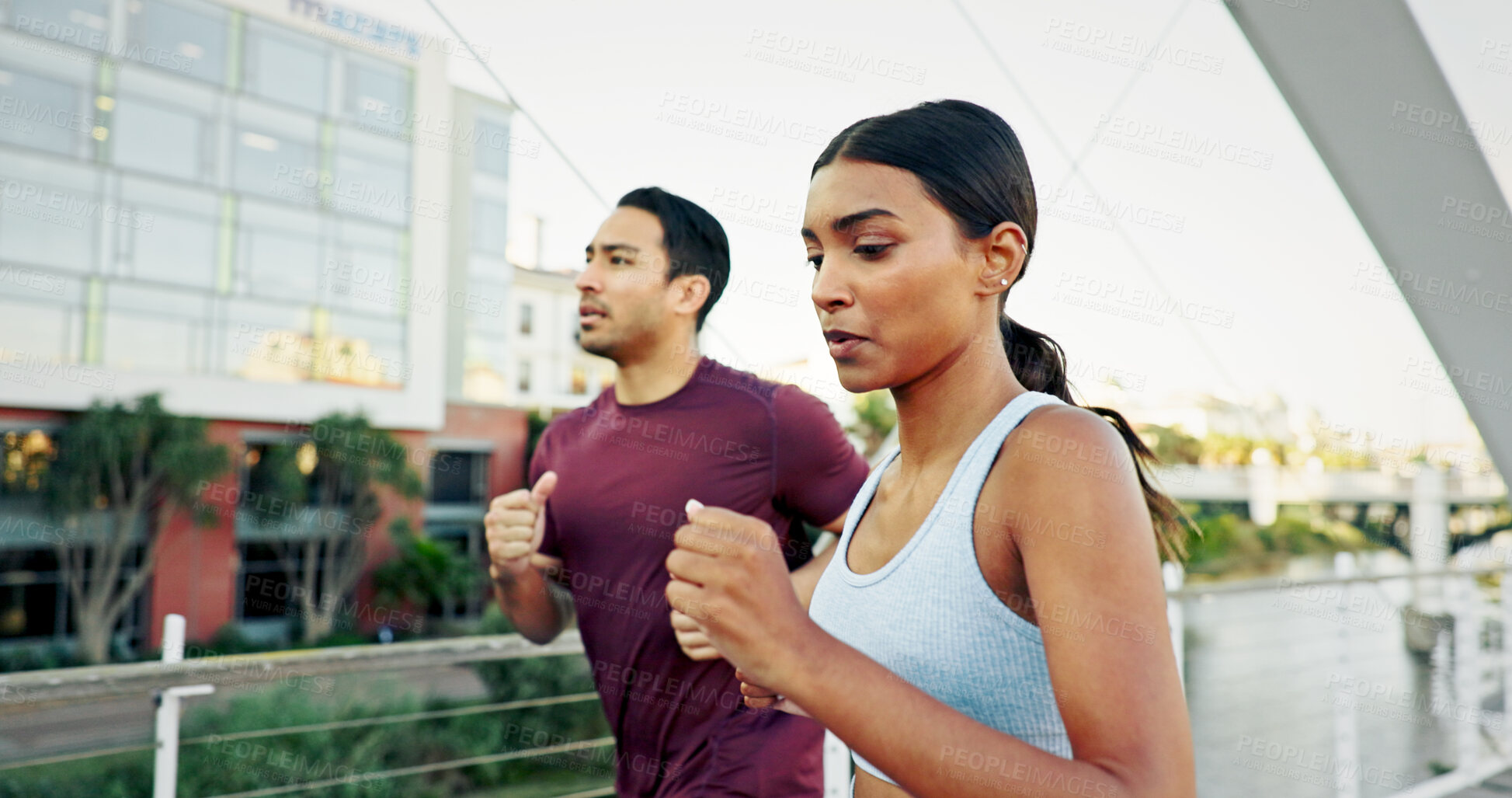 Buy stock photo Interracial couple, fitness and running in city for workout, exercise or training together in urban town. Man, woman and athlete with cardio, sports or marathon for endurance and health or wellness