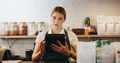 Buy stock photo Tablet, woman and waitress in coffee shop for online menu for order on app for hospitality service. Inventory, reading and female barista with digital technology for stock list in cafe or restaurant.