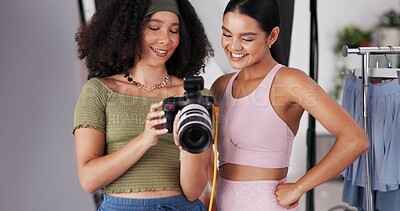 Buy stock photo People, camera and direction with photoshoot in studio, collaboration and instructions for shooting. Women, photographer and speaking to model for filming feedback, review image and backstage project