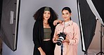 People, camera and team for photoshoot on set, collaboration and instructions for shooting. Women, photographer and speaking to stylist for fashion feedback, review image and backstage portrait