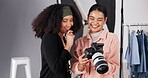 People, camera and discussion for photoshoot on set, collaboration and instructions for shooting. Women, photographer and speaking to stylist for fashion feedback, review image and laughing backstage