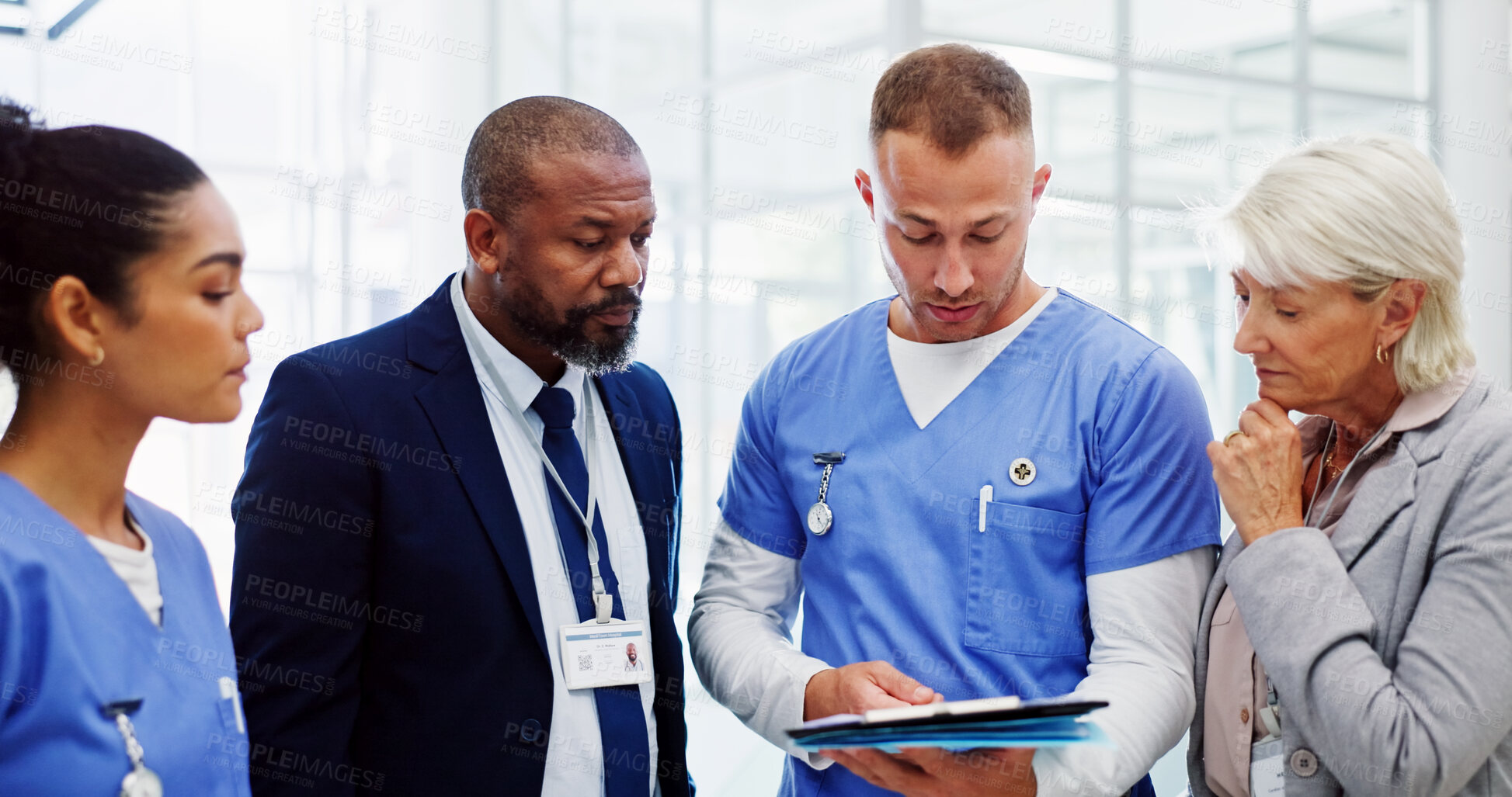 Buy stock photo Healthcare, medical team and meeting in hospital with folder, collaboration and patient report feedback. Mature MD, people or paper in lobby for surgery assessment, insurance claim and service advice