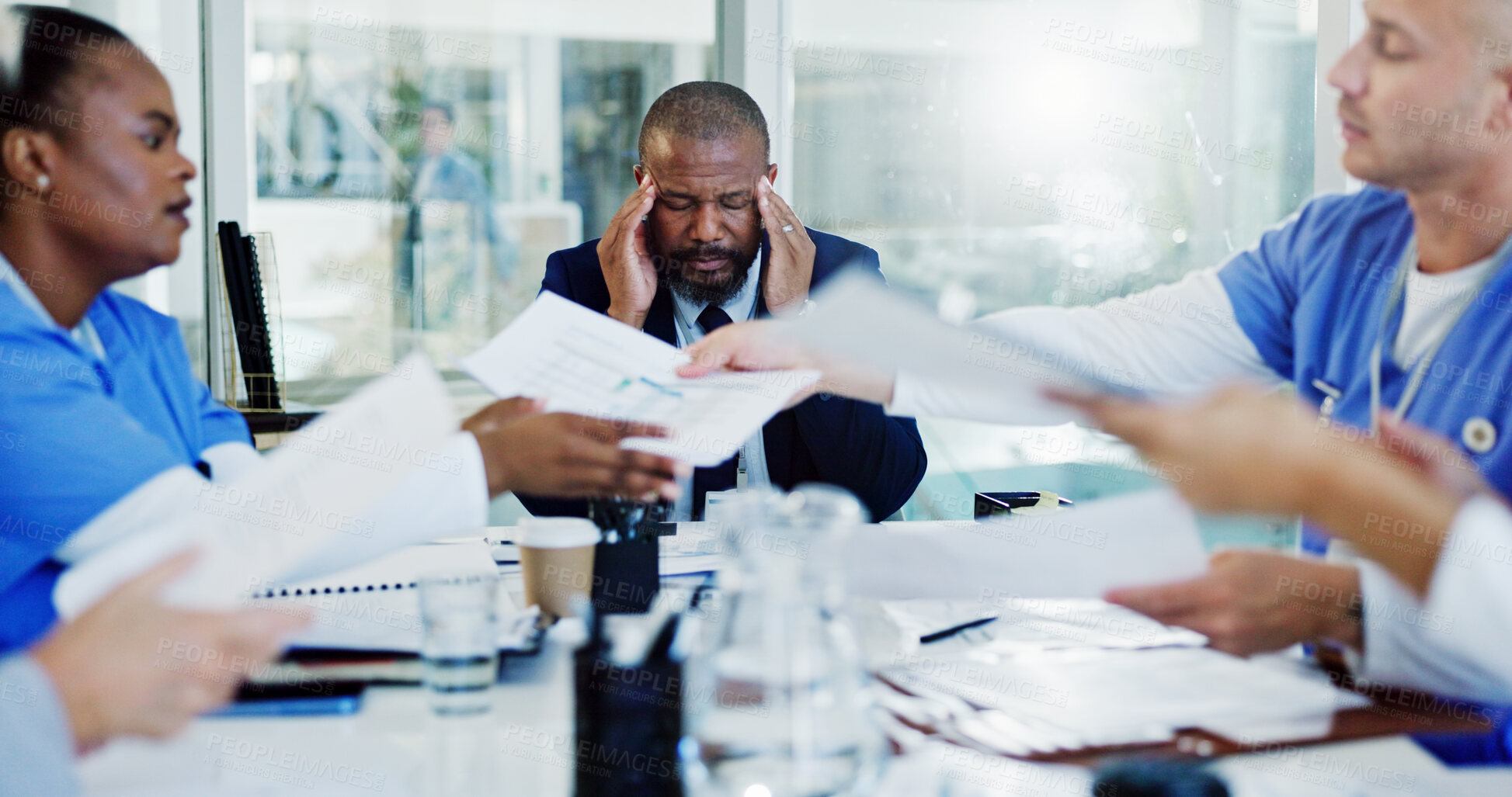 Buy stock photo Frustrated man, doctor or headache with documents in meeting for overworked stress or anxiety at hospital. Businessman, board director or fatigue with migraine for clinic chaos or bad medical funding
