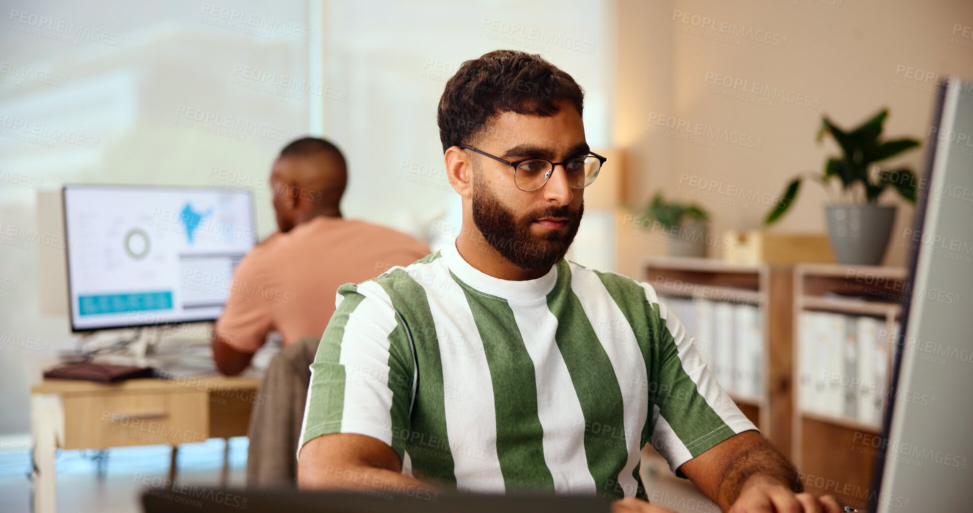 Buy stock photo Thinking, creative business and man on computer in startup office, research and solution for brand promotion. Serious, online and worker reading email for target demographic, geomarketing or ad data
