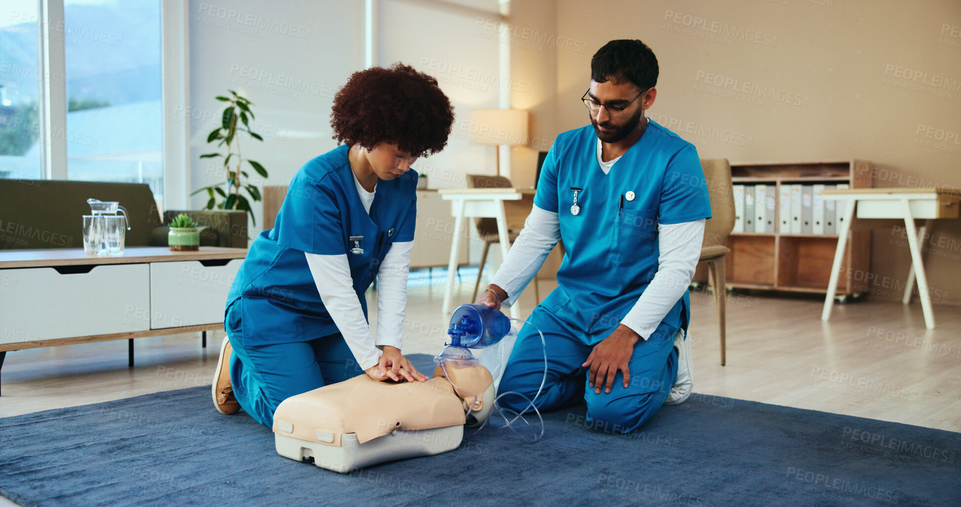 Buy stock photo Students, cpr or nurses teaching with mannequin for first aid practice, cardiac arrest or safety protocol. Healthcare class, advice or people in medical simulation, paramedic course or nursing school