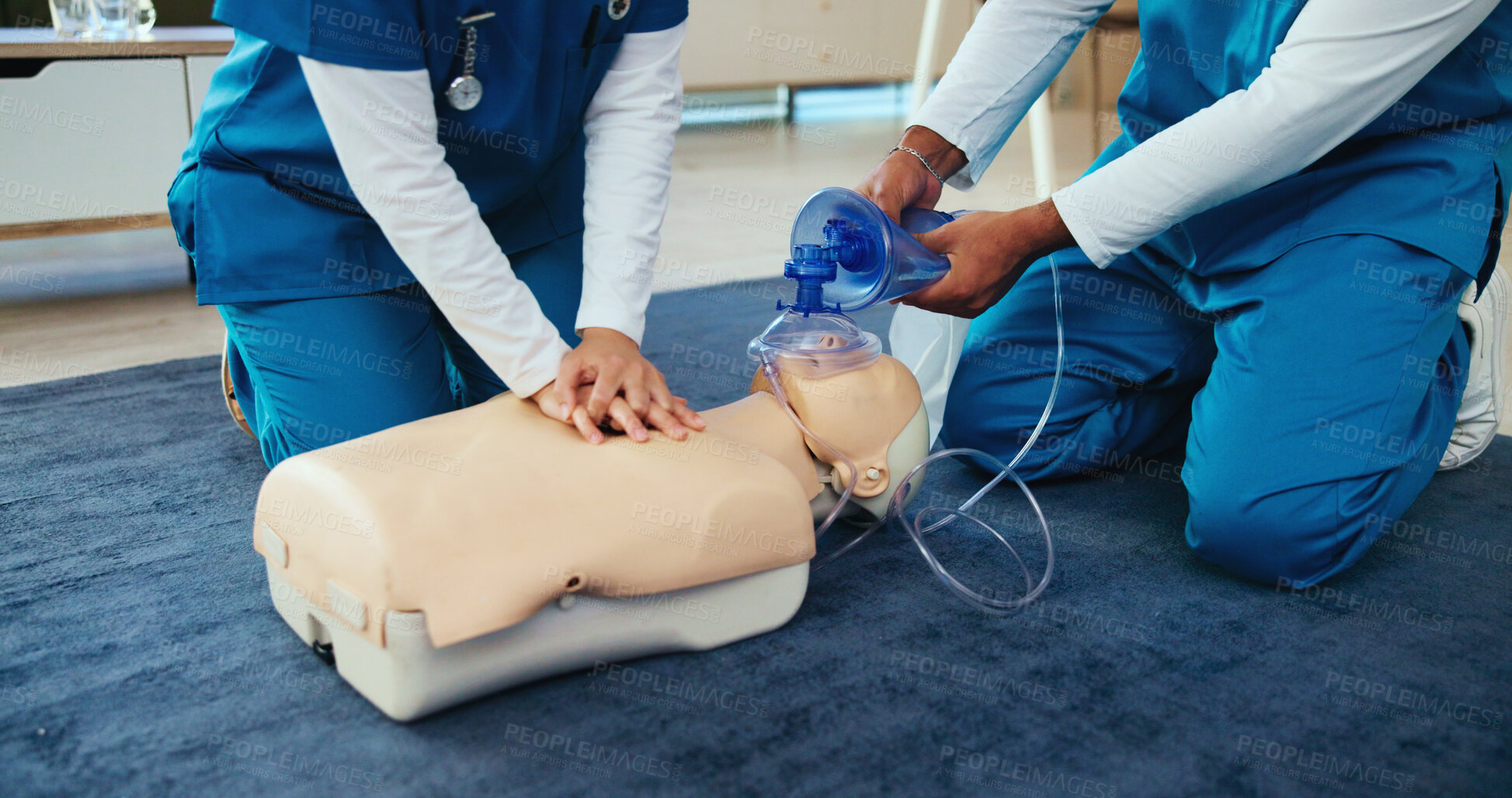 Buy stock photo Mask, medical or nurses learning cpr on mannequin for first aid, help cardiac arrest or safety protocol. Healthcare class, hands or people with respiratory tool in paramedic course or nursing school