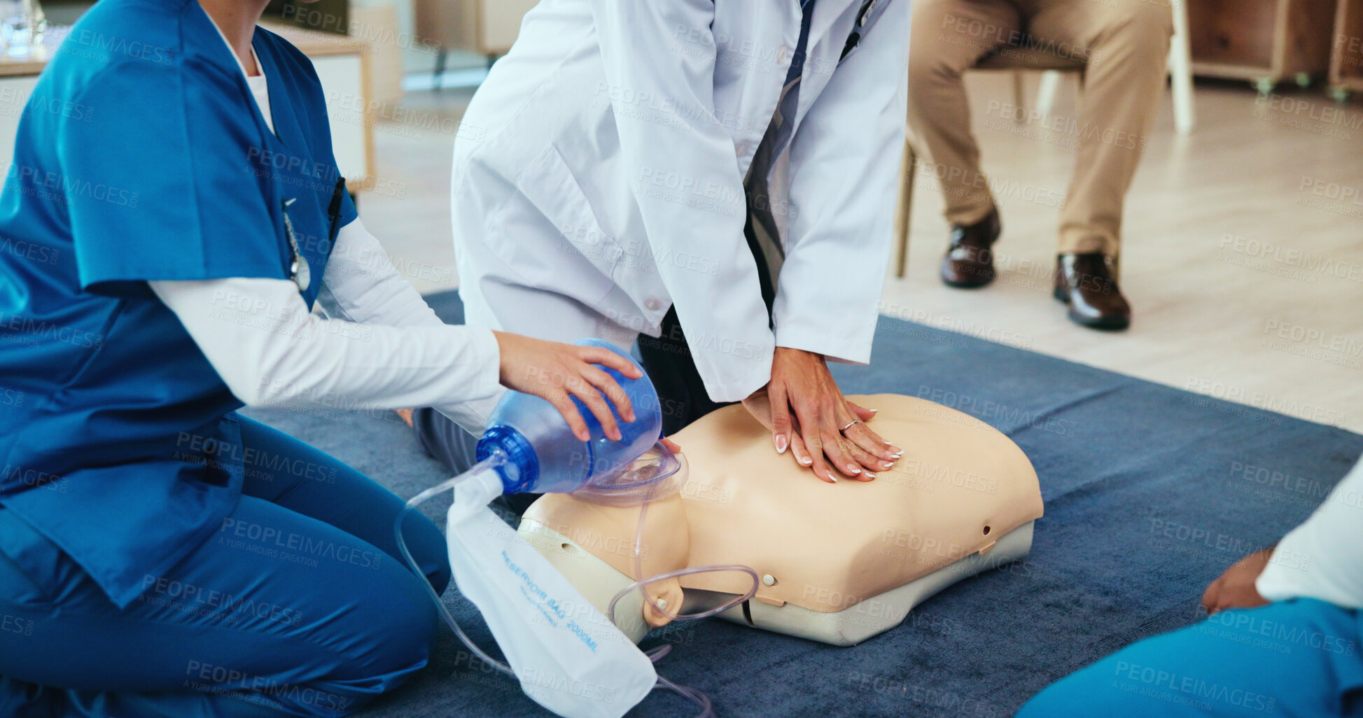Buy stock photo Mask, hands or nurses learning cpr on mannequin for first aid, cardiac arrest or healthcare protocol. Medical class, students or people with respiratory tool in paramedic course or nursing school