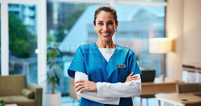 Buy stock photo Healthcare, doctor and portrait in hospital with confidence, pride or public service with smile. Mature woman, medical expert and arms crossed in clinic with experience, about us or expert surgeon