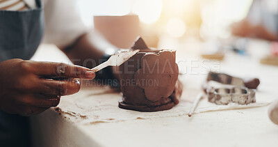 Buy stock photo Pottery, tools and hands of person in studio for sculpture, manufacturing and artist workshop. Ceramics class, mold and creative design with closeup of artisan in handicraft store for mud and hobby
