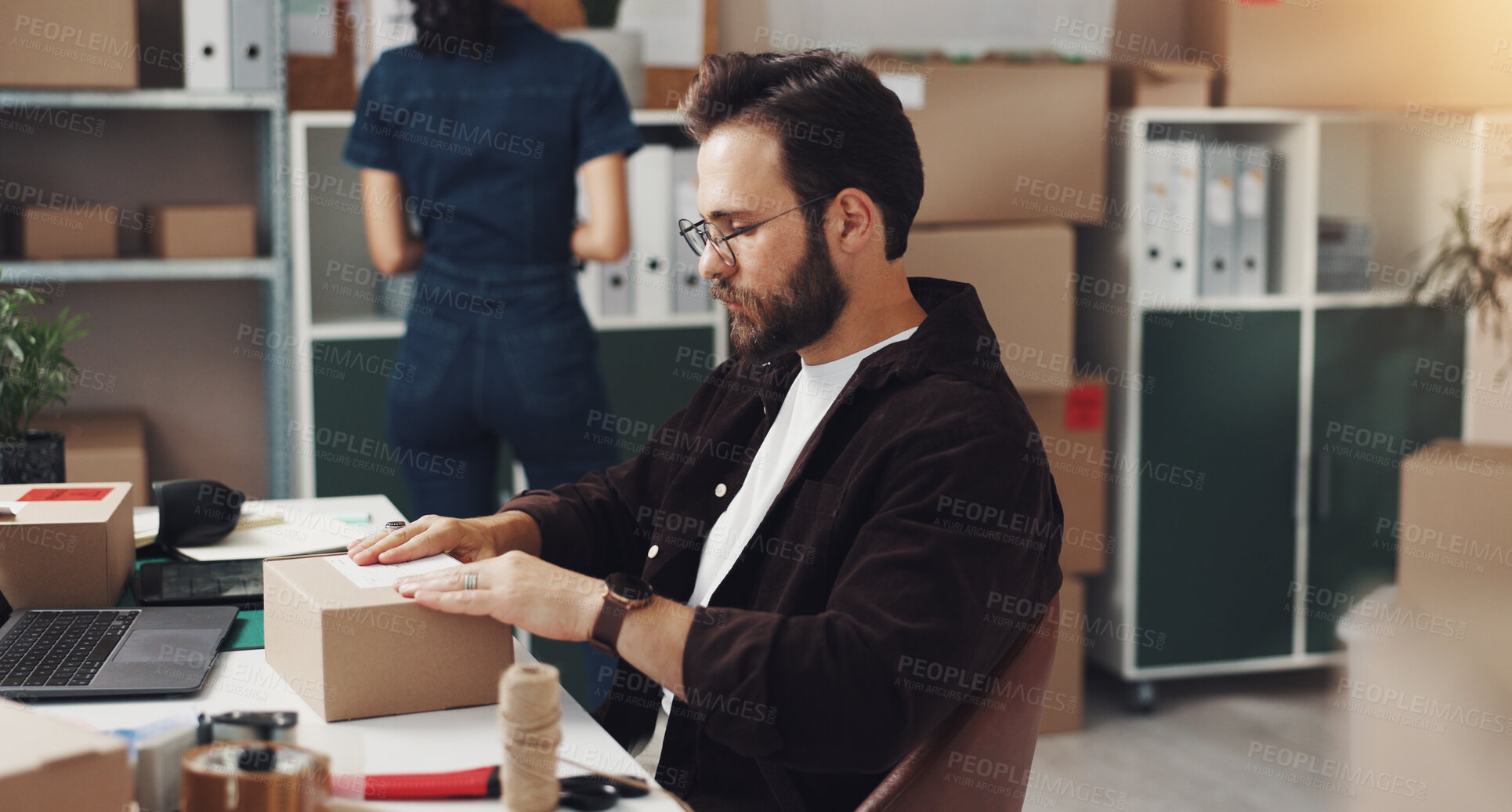 Buy stock photo Businessman, box and label with package for logistics, online delivery or distribution at storage warehouse. Man, distributor or employee packing cargo for supply chain, ecommerce or freight service