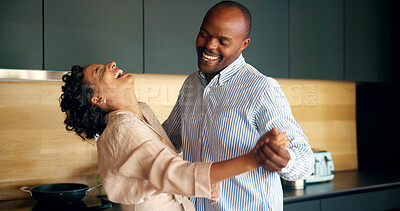 Buy stock photo Couple, laughing and dancing in home, happy and playful romance in loving marriage. People, together and holding hands for commitment joy in relationship, funny humor and silly fun for connection