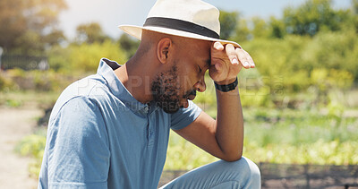 Buy stock photo Tired farmer, man and outdoor on field with crops harvest, overworked or headache with fatigue. Agriculture, black person or summer heat wave on farm with plants conservation, agribusiness or burnout