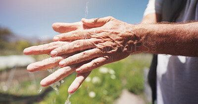 Buy stock photo Farmer, water and washing hands in field, outdoor and hygiene for bacteria, soil or dust in summer. Person, cleaning and liquid for germs, dirt and sand with sustainability for agriculture in Spain