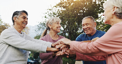Buy stock photo Nature, senior people and hands with huddle for fitness, support and celebration together with smile. Outdoor, retirement and friends with stack for solidarity, exercise goal or happy with motivation