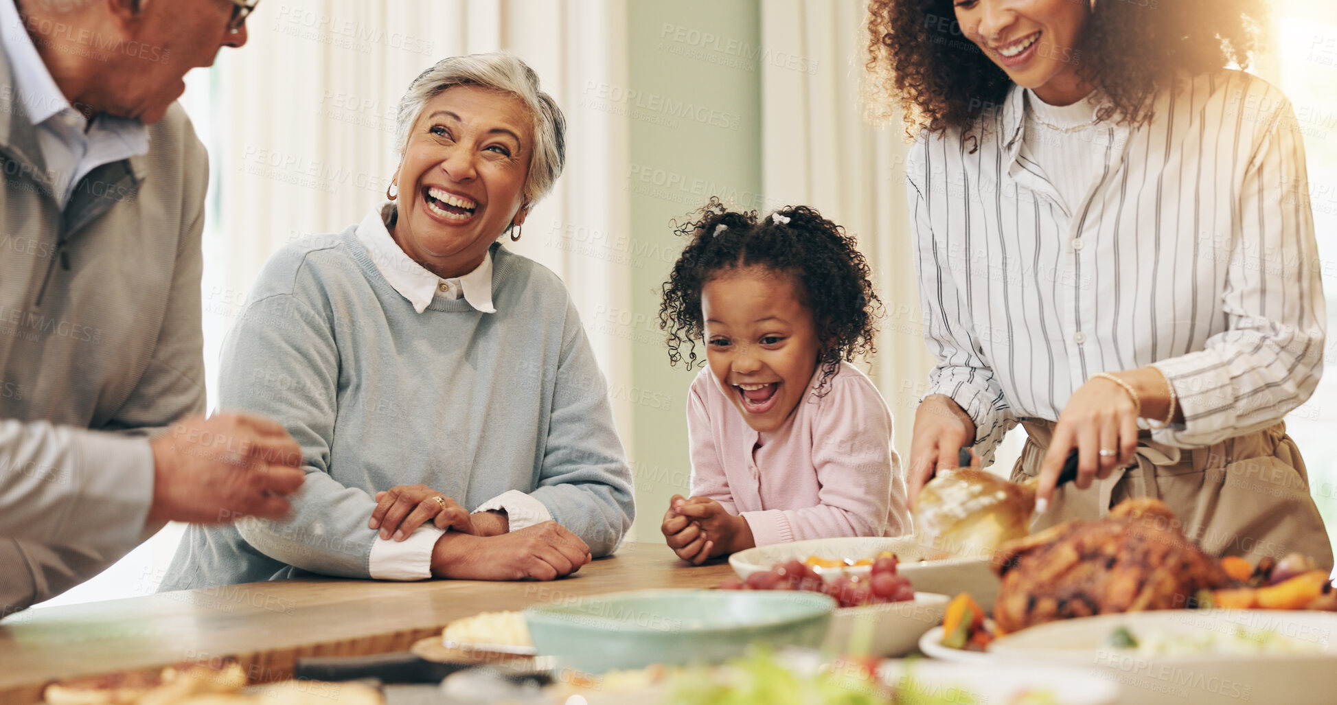 Buy stock photo Happy family, laughing or dining with children for thanksgiving dinner together by table at home. Grandparents, young child or dishing with smile or meal for bonding weekend or holiday feast at house