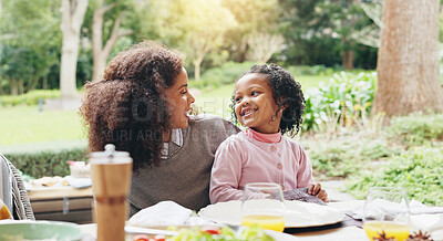 Buy stock photo Mother, child and outdoor dining table for eating on holiday, easter lunch and celebrate family. Mom, holding kid and conversation on buffet nutrition in garden, social gathering and patio party