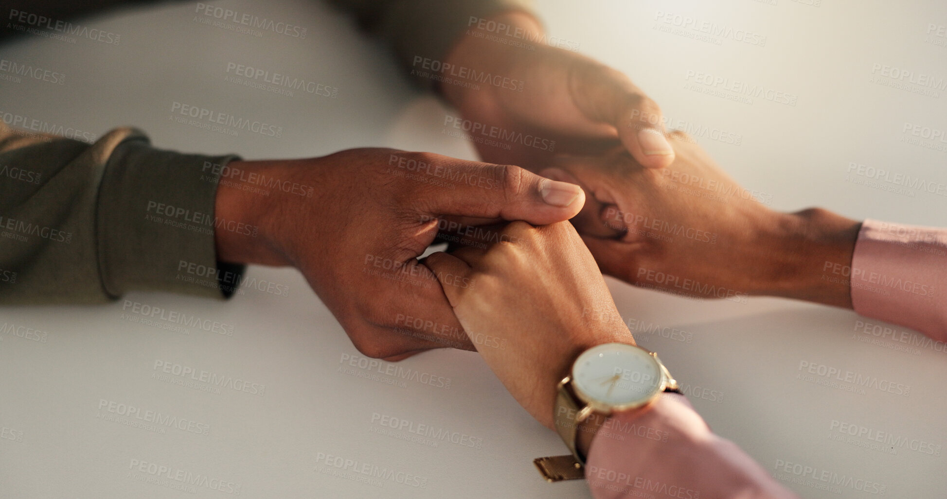 Buy stock photo Holding hands, support and couple in home for love, compassion and communication on table. Relationship, dating and closeup of man and woman with affection or gesture for commitment, trust or comfort