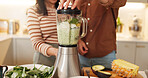 Couple, kitchen or hand with smoothie in blender for mixing ingredient, breakfast diet or health nutrition. People, close lid or machine in home for protein shake, organic drink or recipe preparation