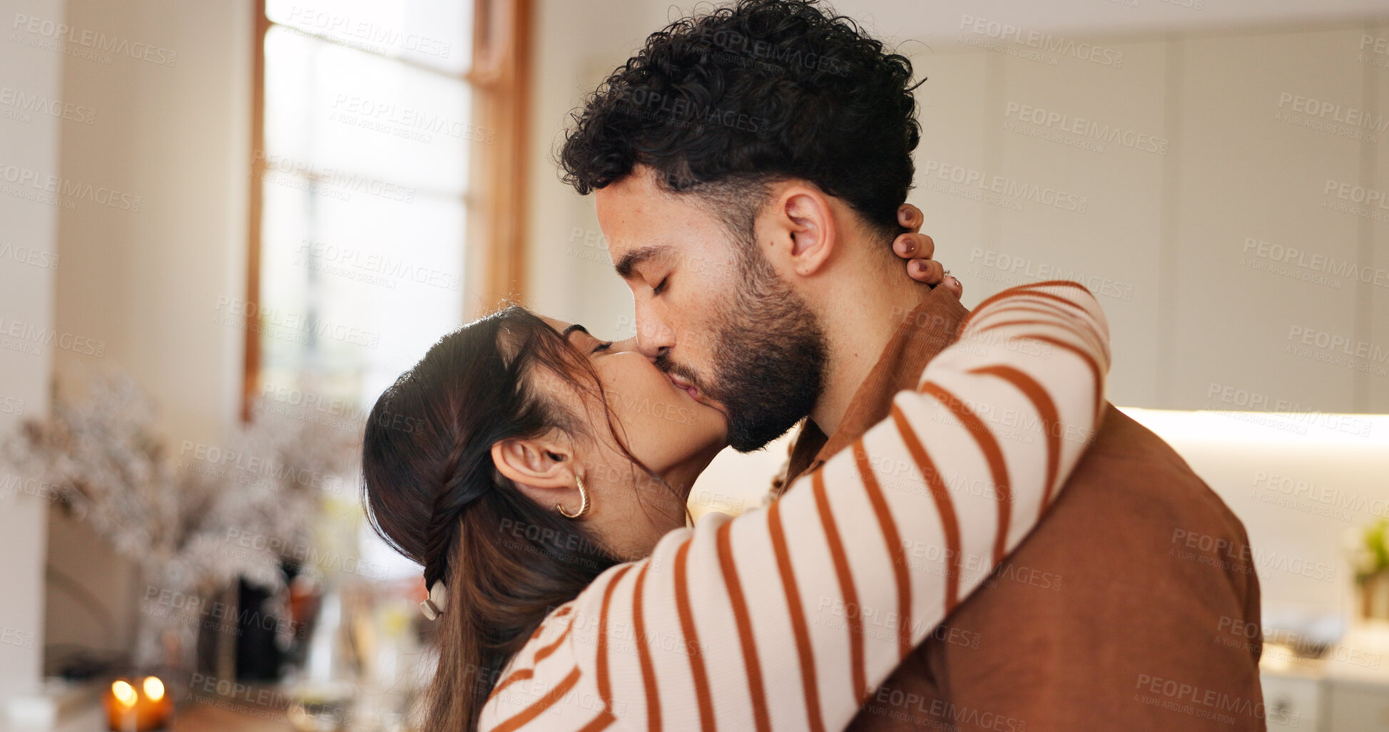 Buy stock photo Couple, date and kiss in home embrace, valentines day and trust in relationship. Partnership, romance and support husband with commitment in love, bonding and sweet moment of affection in marriage