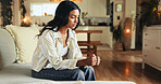 Woman, sofa and nervous with anxiety in home for decision, worry and overwhelmed with pressure. Person, hope and faith in lounge with bad news, mistake and praying for stress, depression and tension