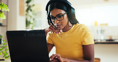 Buy stock photo Laptop, music and remote work with woman in home office as graphic designer for marketing campaign. Computer, headphones and illustration with freelance Indian employee in apartment for publication
