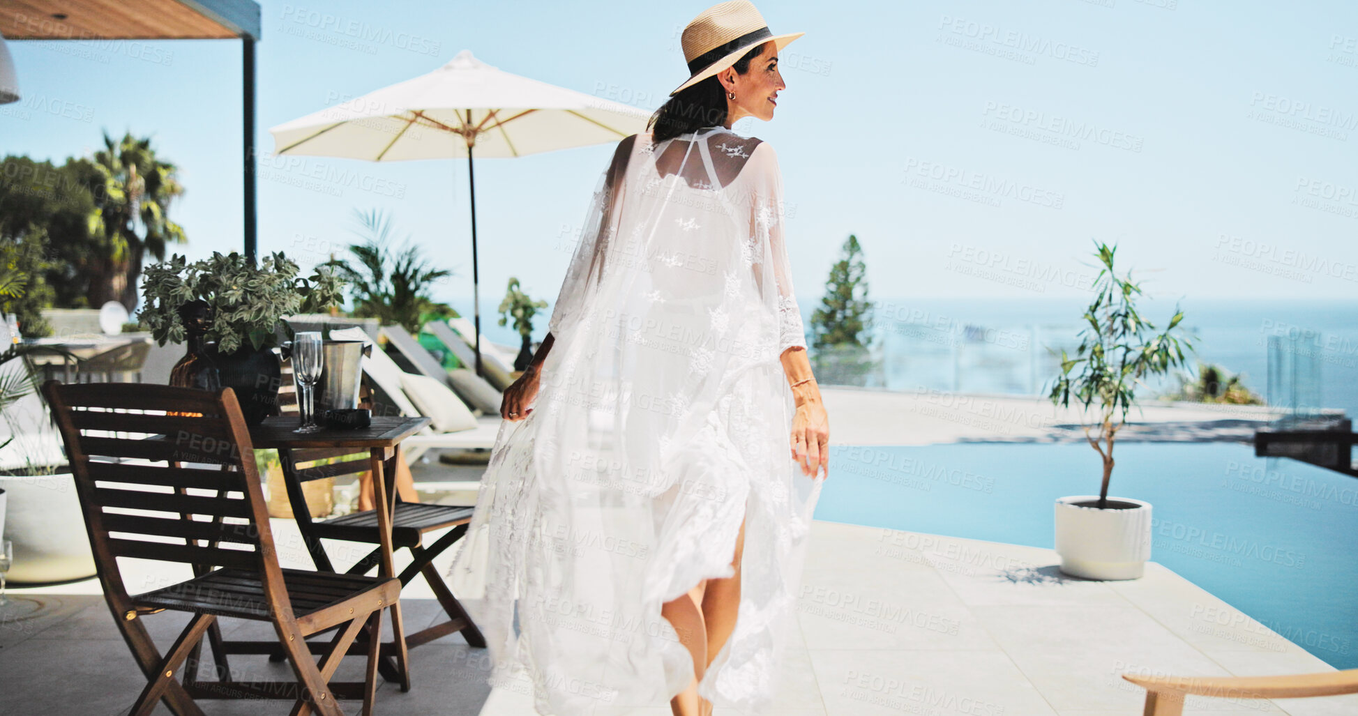 Buy stock photo Woman, back and swimming pool with vacation, view and excited for trip, break and travel. Luxury resort, peace and girl with smile, adventure and carefree for hotel accommodation or hospitality