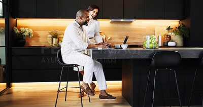 Buy stock photo Planning, laptop and success with interracial couple in kitchen for travel itinerary, flight booking and vacation package. Passport approval, smile and airline review with man and woman at home
