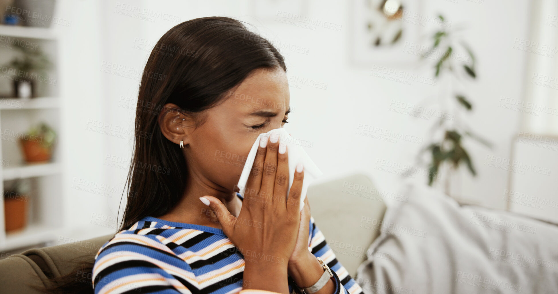 Buy stock photo Sick woman, sofa and blowing nose with tissue for influenza, virus or viral infection at home. Female person, flu or cold with sinus for bad allergy, allergic reaction or hayfever attack at house