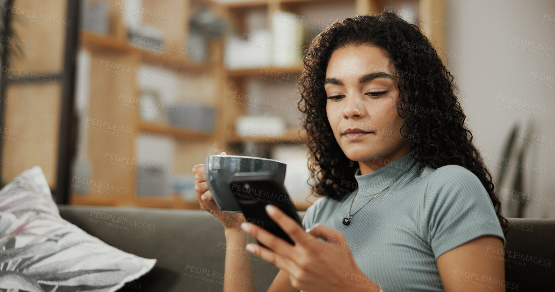Buy stock photo Woman, coffee and phone to relax in home, reading notification and online for social media. Scroll, cup of espresso and website for ebook in living room, typing message and hot chocolate for peace