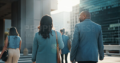 Buy stock photo Back, collaboration and walking with business people in city together for travel to work. Building, commute or direction with man and woman corporate employee group outdoor in urban town for journey