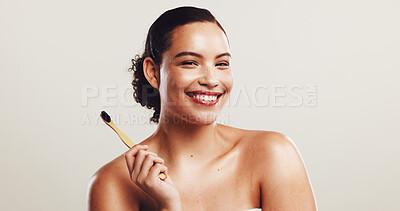 Buy stock photo Happy woman, portrait and bamboo with toothbrush in studio for dental hygiene or routine on a white background. Female person, model or smile with teeth for oral, mouth or gum care on mockup space