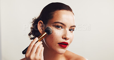Buy stock photo Makeup, woman and portrait with brush in studio, cosmetics and application by mockup space. Lipstick, female person and model with smooth face for beauty, foundation and wellness by white background