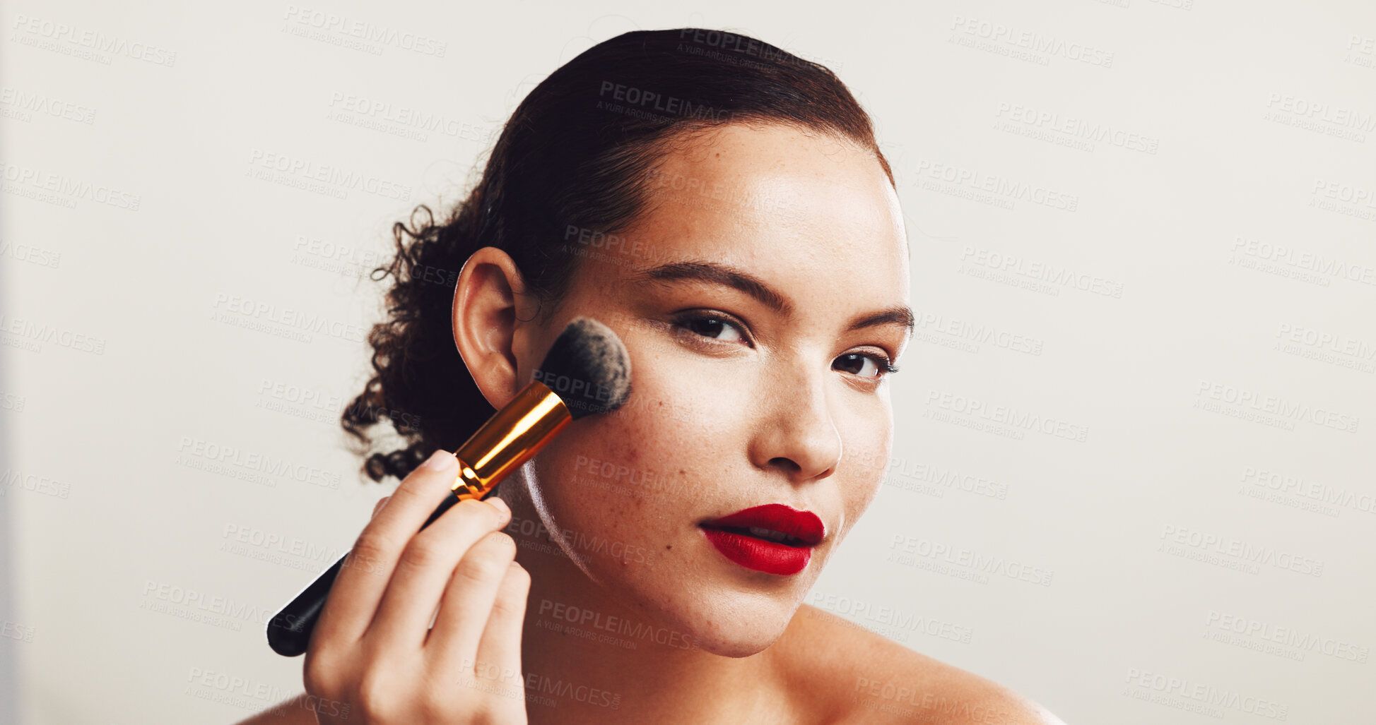 Buy stock photo Makeup, woman and portrait with brush in studio, cosmetics and application by mockup space. Lipstick, female person and model with smooth face for beauty, foundation and wellness by white background