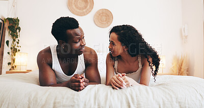 Buy stock photo Happy, love and couple talking on bed for relaxing, relationship and bonding in hotel. Marriage, morning and man with woman in bedroom for affection, commitment and conversation on valentines day