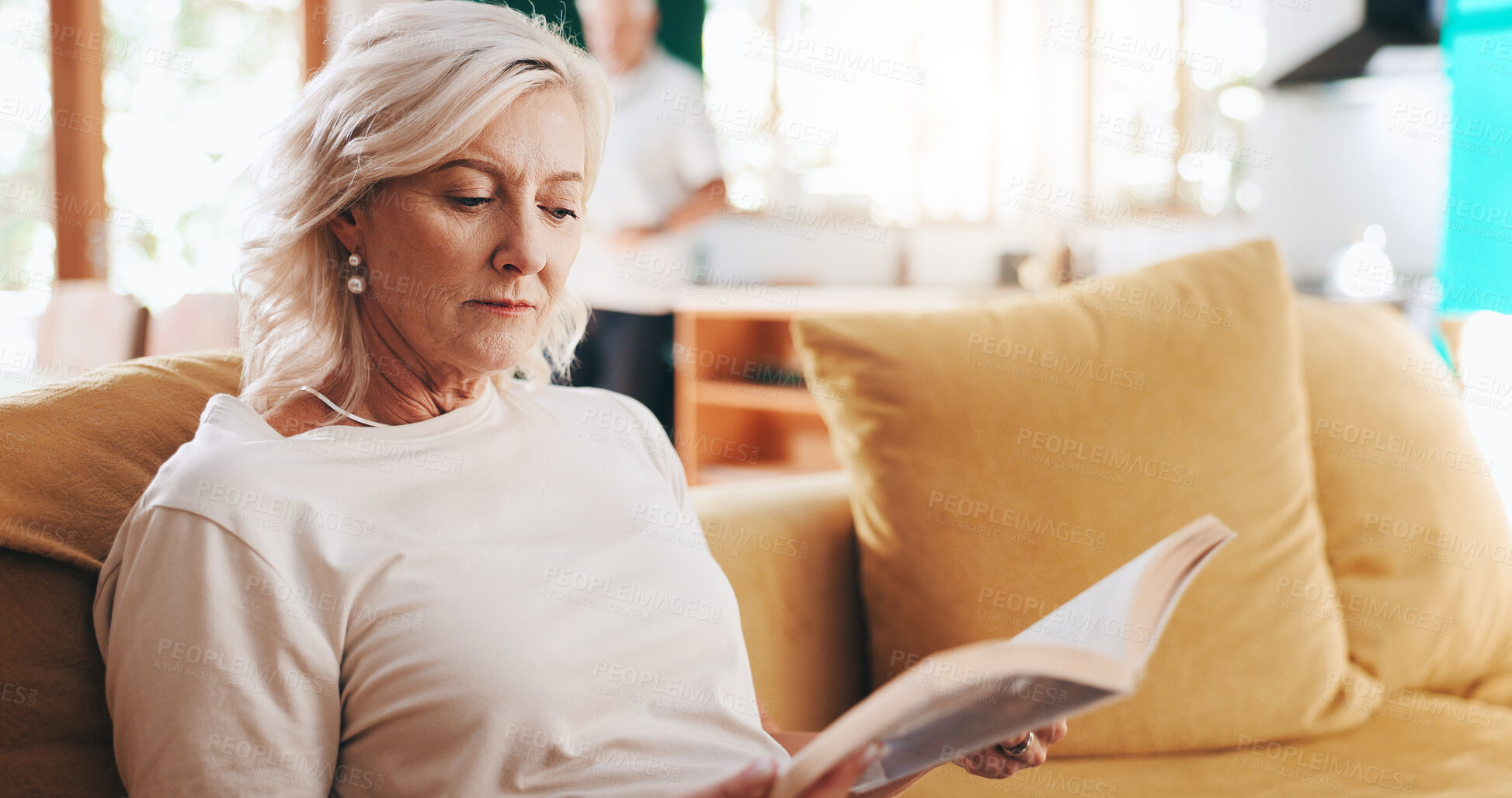 Buy stock photo Old woman, book and reading to relax in home, learning new language and novel for entertainment. Hobby, peace and fiction to imagine story in living room, retirement and rest with fantasy information
