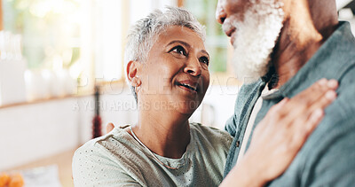 Buy stock photo Senior couple, support and hug in home, marriage celebration and trust connection with love. Embrace, holding husband and sweet romance in old age, commitment and kitchen date for valentines day