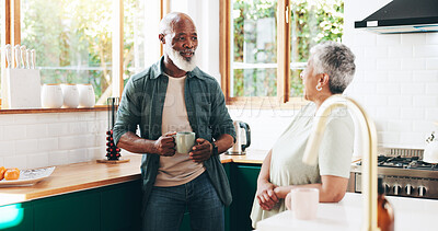 Buy stock photo Senior, couple and talking with coffee in kitchen for communication, morning start and bonding together. Elderly people, discussion and caffeine drink for wellness, affection and retirement at house