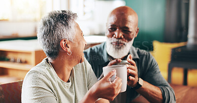 Buy stock photo House, coffee and old couple with love, cheers and bonding together with relationship. Conversation, senior man and mature woman in living room, cappuccino and herbal tea with marriage and discussion