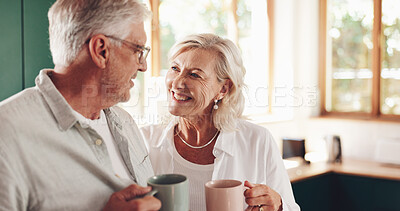 Buy stock photo Elderly couple, talking and coffee in home, love and enjoying conversation with happy wife in kitchen. Senior people, smile and support by listening for healthy marriage, tea cup and retirement