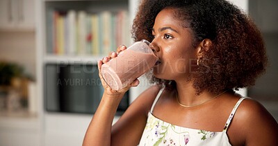 Buy stock photo Woman, drinking and healthy smoothie at house for nutrition drink, detox benefits and weight loss process. African, person and organic beverage of natural diet, morning protein and digestion wellness