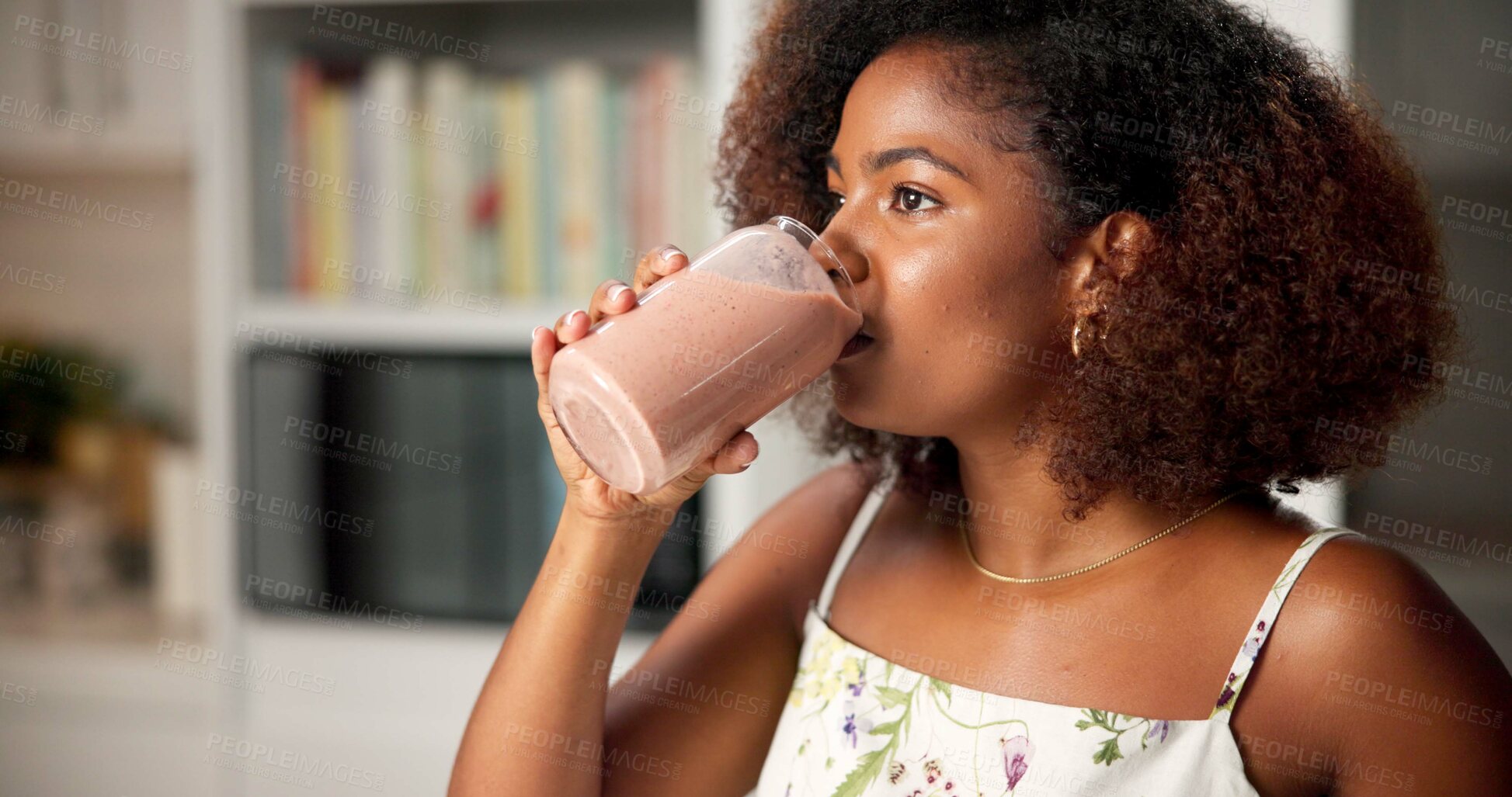 Buy stock photo Woman, drinking and healthy smoothie at house for nutrition drink, detox benefits and weight loss process. African, person and organic beverage of natural diet, morning protein and digestion wellness